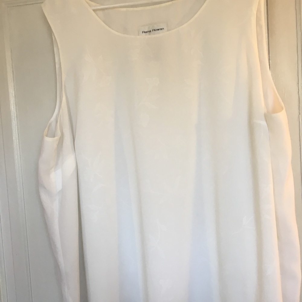 22W white shell.  Flowers can be seen in light.